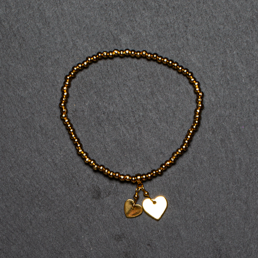 Elasticated Heart Charm Bracelet In Gold Plate