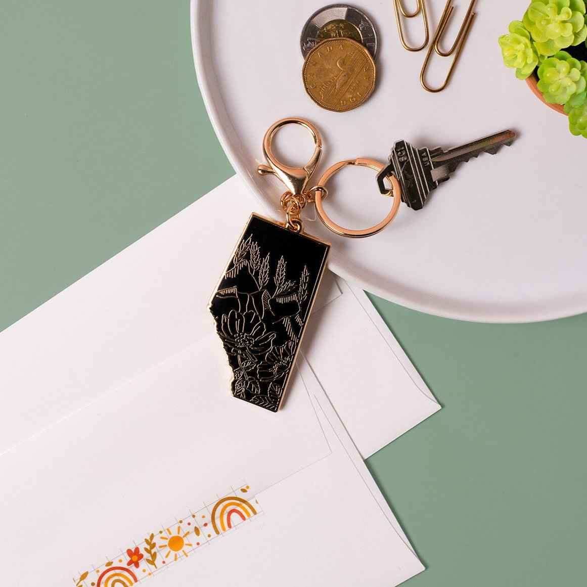 Alberta Black & Gold Enamel Mountain Keychain