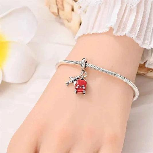 Crimson Horizons Sterling Silver Travel Charm