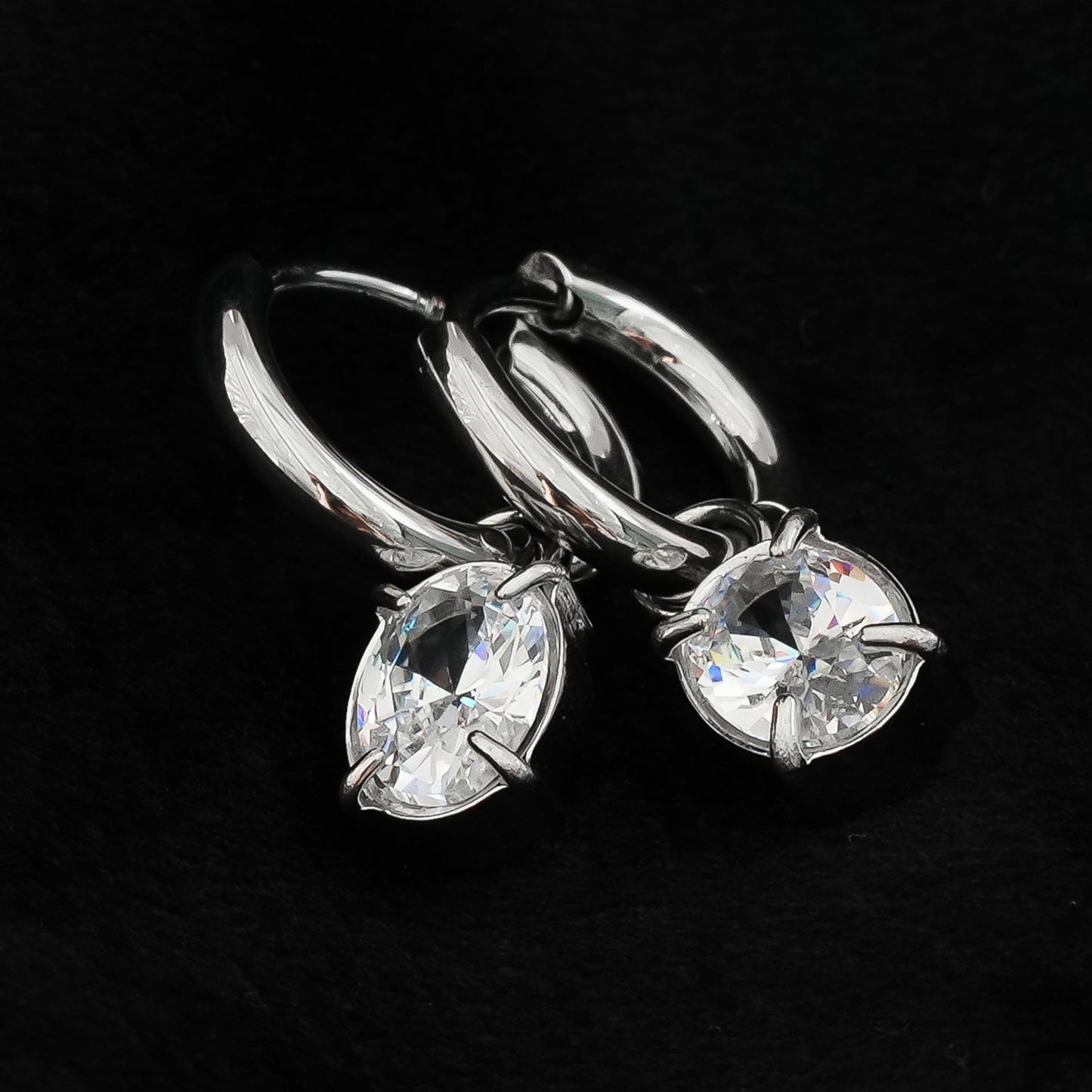 SEDONA Silver (White Gold): Mini Hoop Earrings Anchoring an Encased Zirconia (CZ) Charm