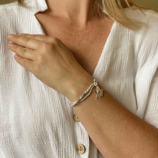 Double Strand Bracelet With Origami Bird Pendant In Silver Plate