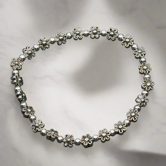 Elasticated Flower Bracelet In Silver Plate