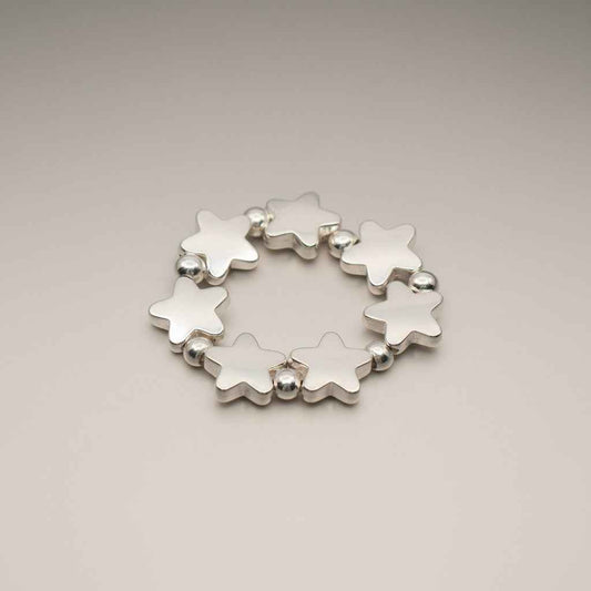 Elasticated Star Ring In Silver Plate